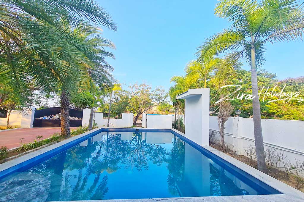 swimming pool with waterfalls in ecr for rent