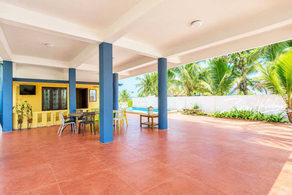 swimming pool with waterfalls features in kovalam ecr