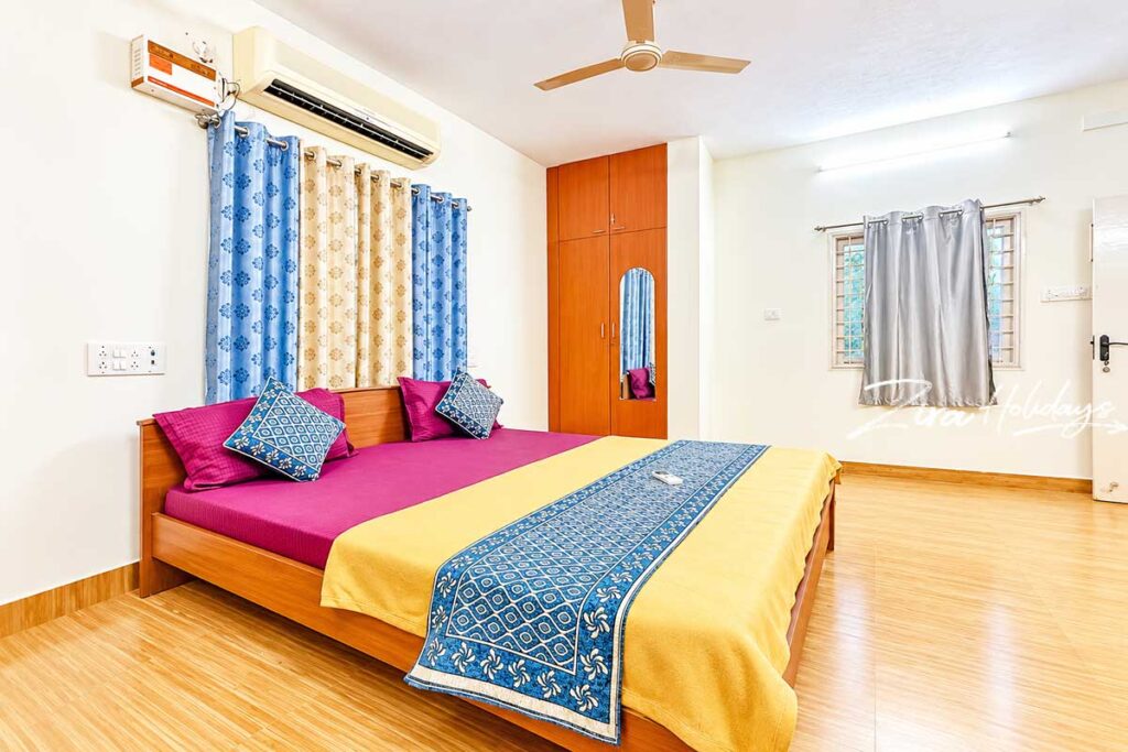 Spacious bedroom at LimeTree Beach House Panaiyur