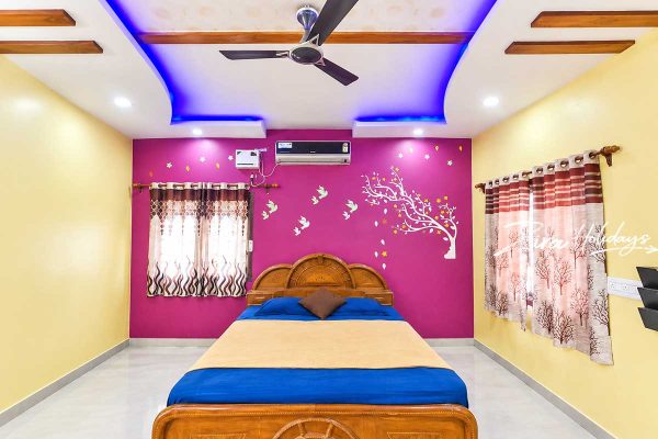 Comfortable bedroom at Regent Beach House in Kovalam ECR